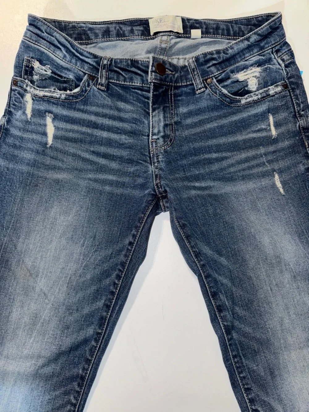 BKE Women’s Stella Boot Cut Jeans - Faded Blue with Distressed‎ Details Size 28L